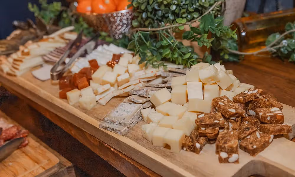Cheese display at Bear Den Grille during Black Bear wedding cocktail hour.