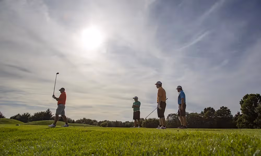 Golfers on a course at Crystal Springs Resort