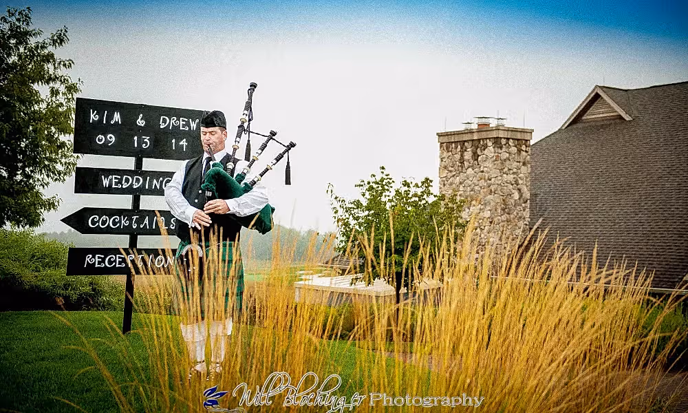 Bagpiper playing at wedding at Ballyowen golf club