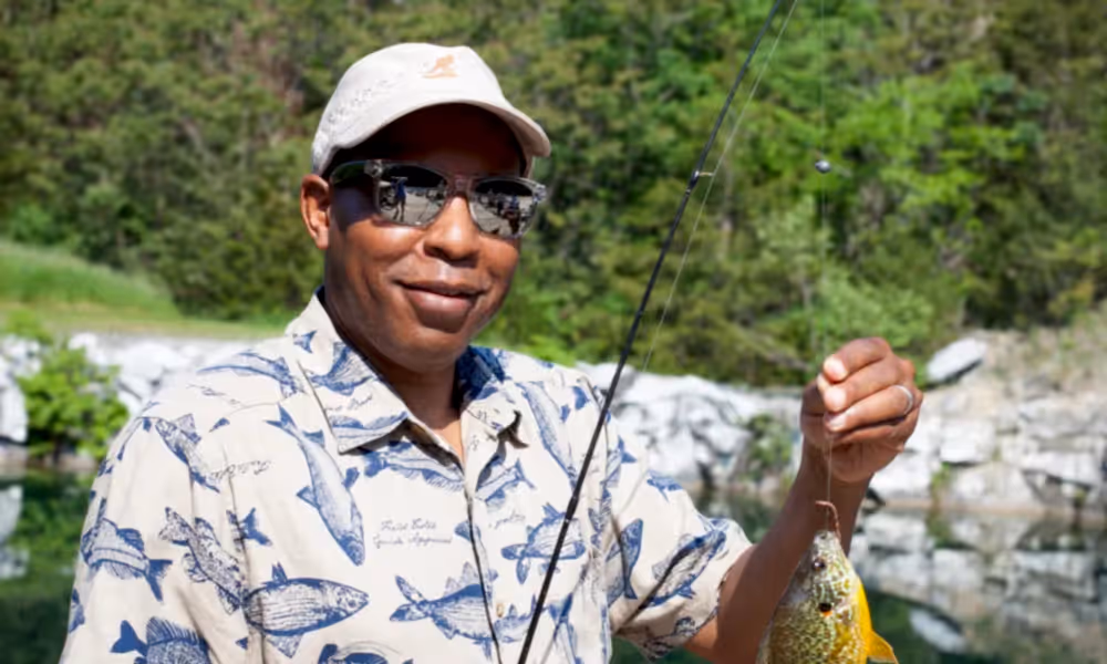 Man holding fish at the quarry