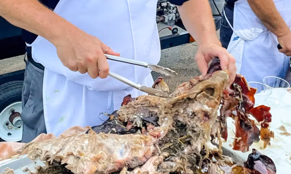 Chef carving at Black Bear Bourbon BBQ
