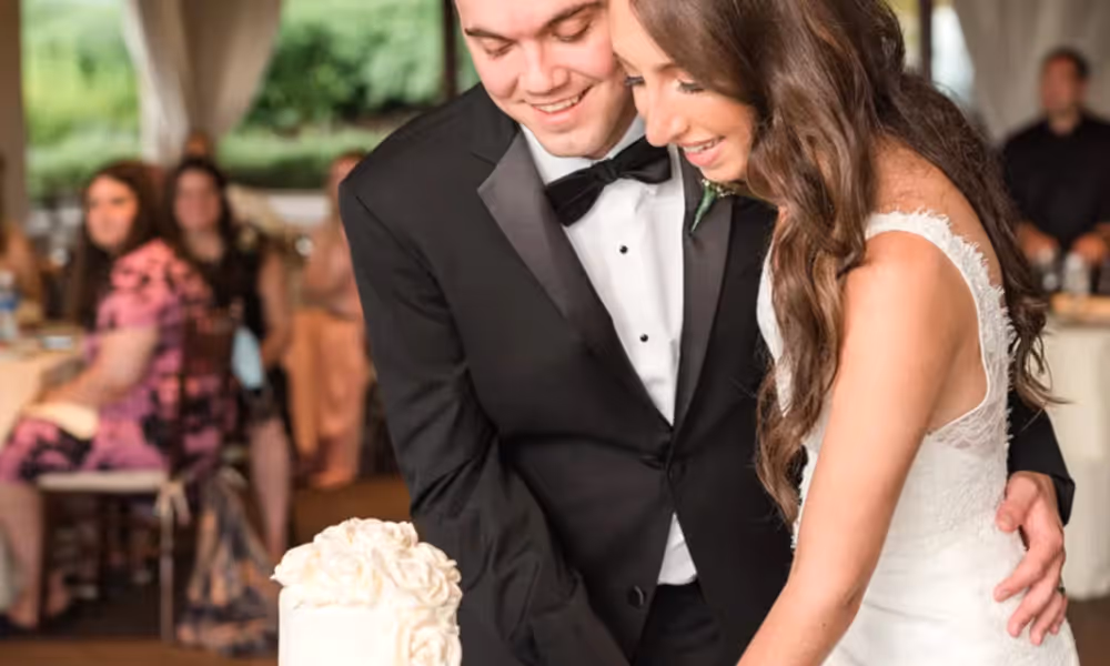 Bride and Groom cutting wedding cake