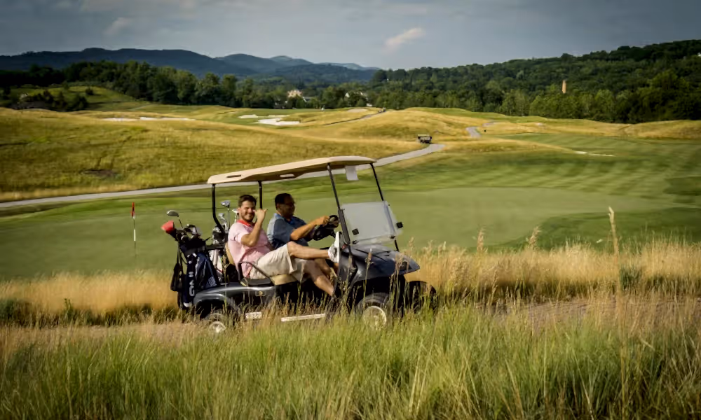 Men on golf cart