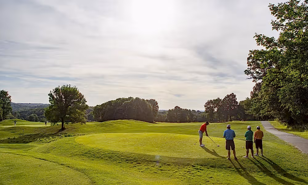 Golfers on a course at Crystal Springs Resort