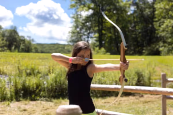 Girl shooting an arrow.