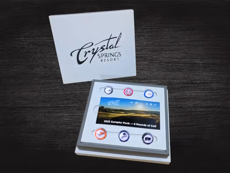 Gold ball markers in sample pack for all 6 golf courses at Crystal Springs