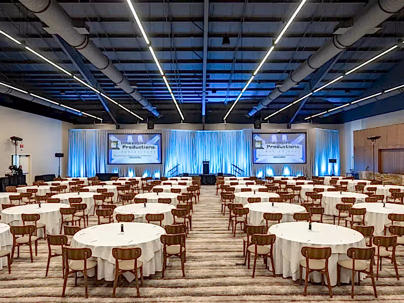 Canyon Ballroom at Minerals Hotel set up with round tables.